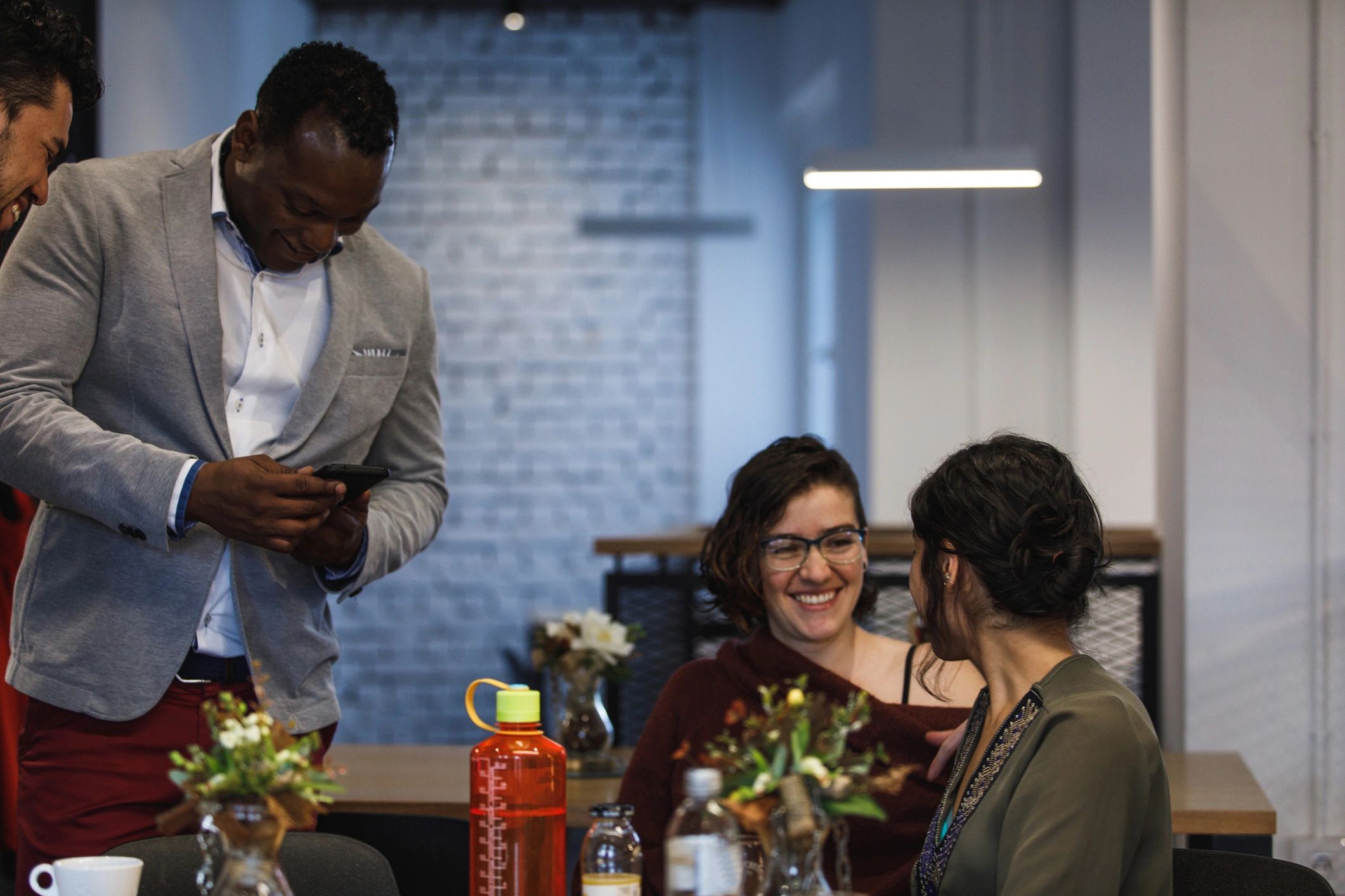 Founder chatting with peers during a community meetup