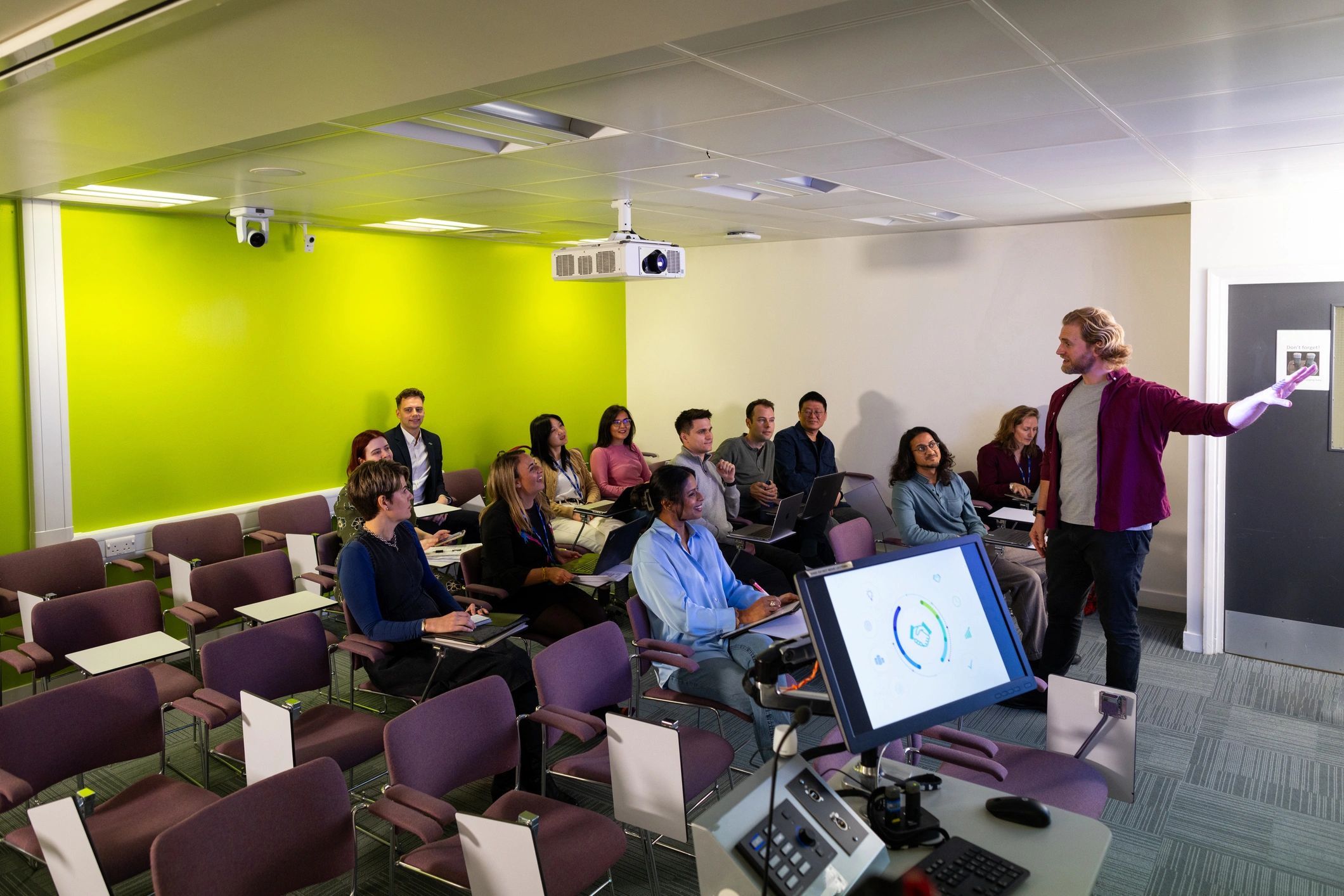 Group attending a seminar in a lecture hall